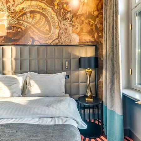 Grand Poet Hotel And Spa By Semarah Riga Exterior foto A room at the hotel