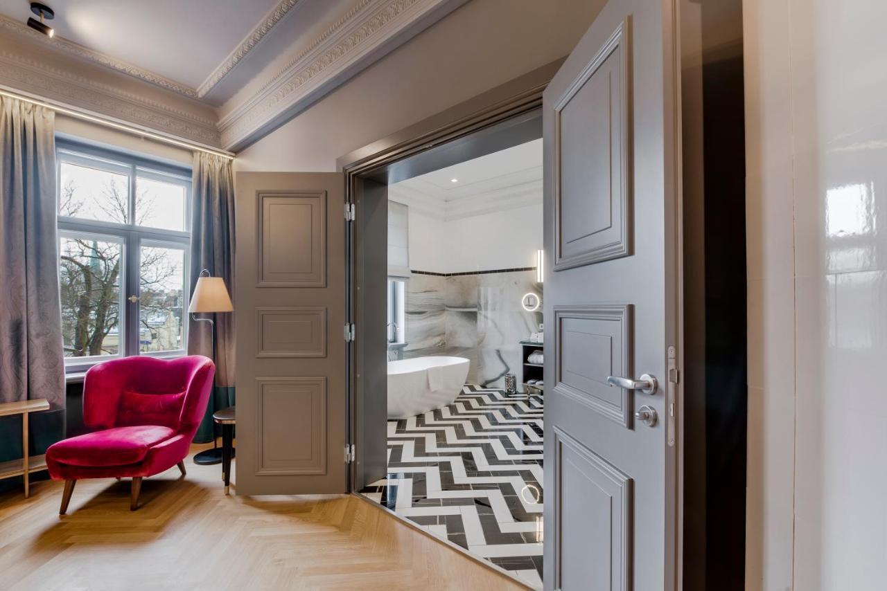 Grand Poet Hotel And Spa By Semarah Riga Exterior foto A room at the hotel