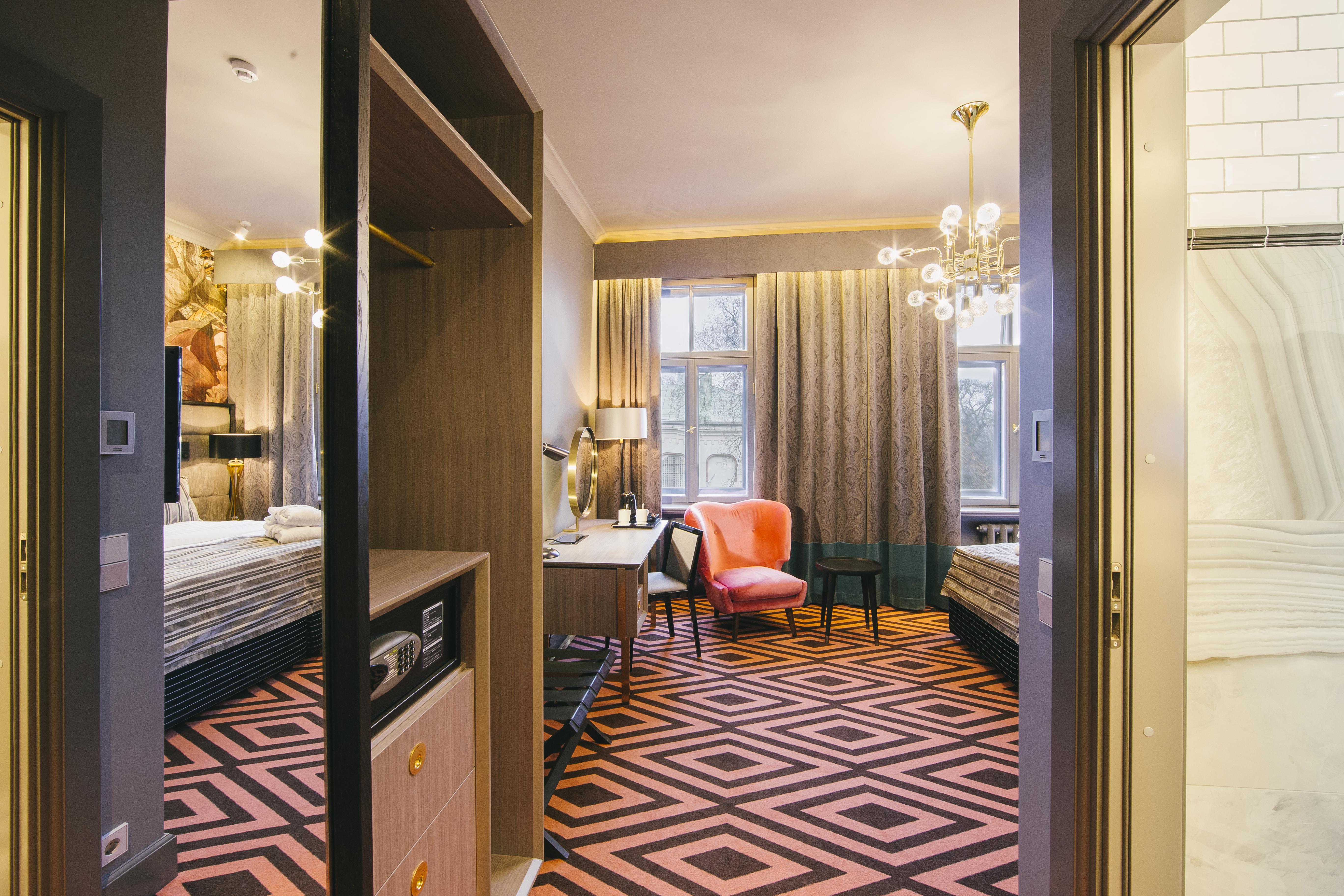 Grand Poet Hotel And Spa By Semarah Riga Exterior foto A suite at the hotel