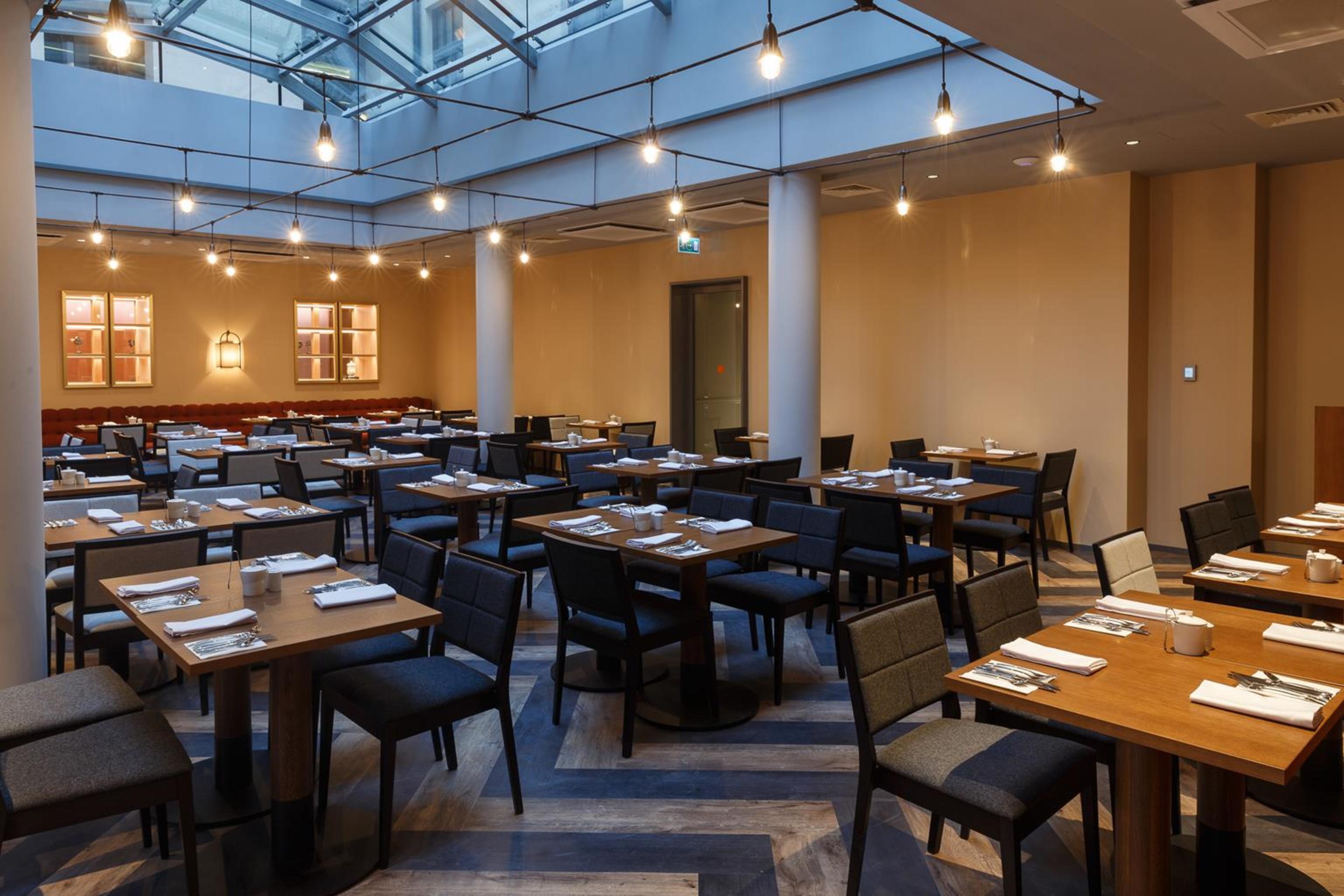 Grand Poet Hotel And Spa By Semarah Riga Exterior foto The restaurant