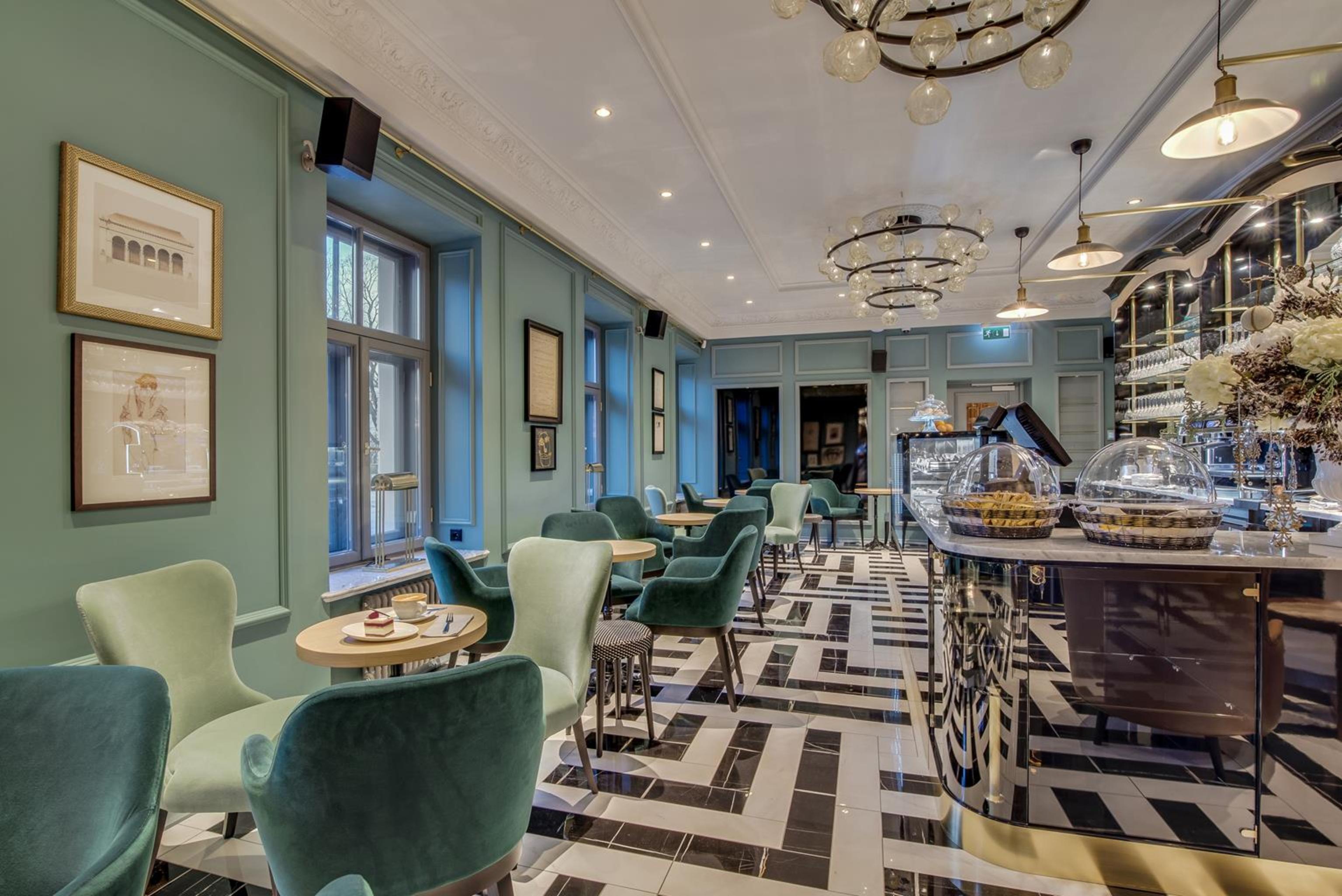 Grand Poet Hotel And Spa By Semarah Riga Exterior foto The interior of the restaurant